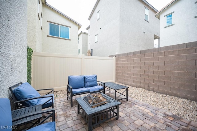 view of patio featuring a fenced backyard and an outdoor hangout area