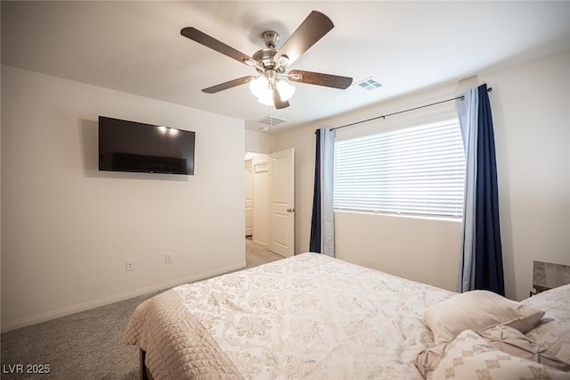 bedroom with visible vents, ceiling fan, light carpet, and baseboards