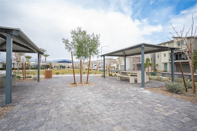 view of property's community with a residential view and a gazebo