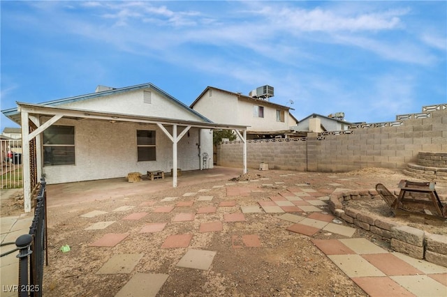 view of patio / terrace featuring cooling unit and a fenced backyard