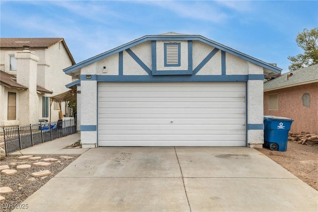 garage featuring fence