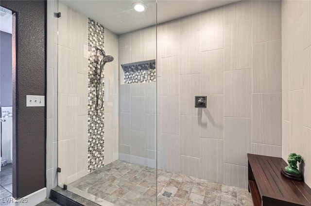 bathroom featuring a walk in shower