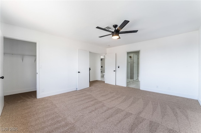 unfurnished bedroom featuring ceiling fan, baseboards, and carpet flooring