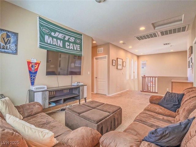 carpeted living room with recessed lighting, visible vents, and baseboards