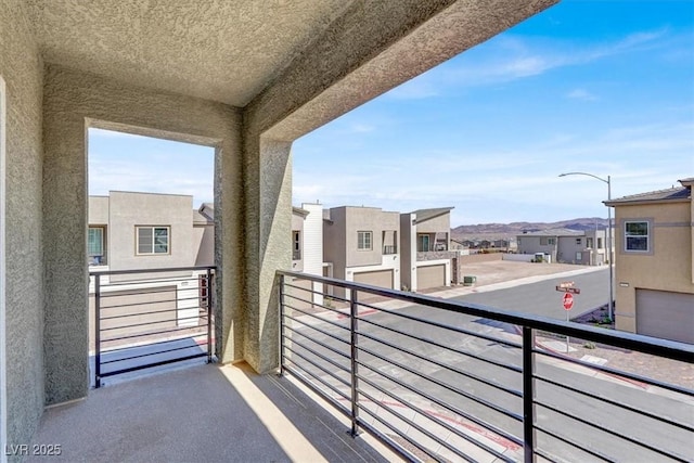 balcony featuring a residential view