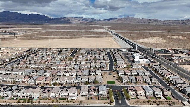 birds eye view of property featuring a residential view and a mountain view