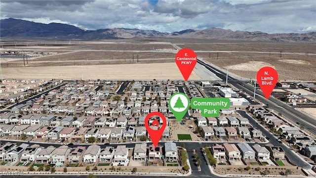 4211 Enchanting Sky Ave, North Las Vegas, NV 89081 - aerial view of residential area featuring a mountain backdrop