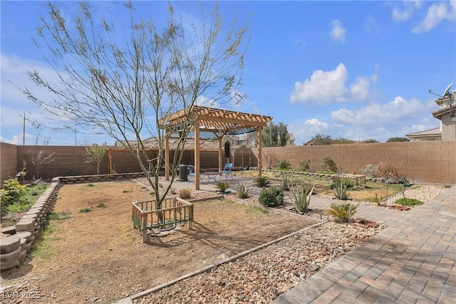 view of yard featuring a patio area, a fenced backyard, and a pergola