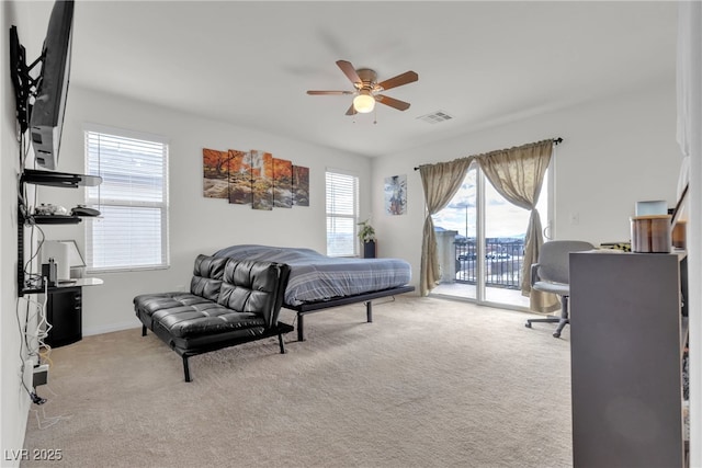 bedroom featuring ceiling fan, carpet flooring, visible vents, baseboards, and access to exterior