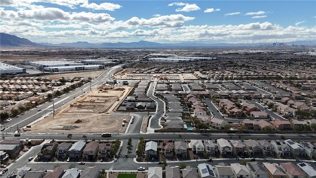 drone / aerial view with a residential view and a mountain view