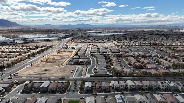 4211 Enchanting Sky Ave, North Las Vegas, NV 89081 - aerial view of property's location with nearby suburban area and a mountainous background