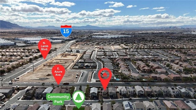 bird's eye view featuring a residential view and a mountain view