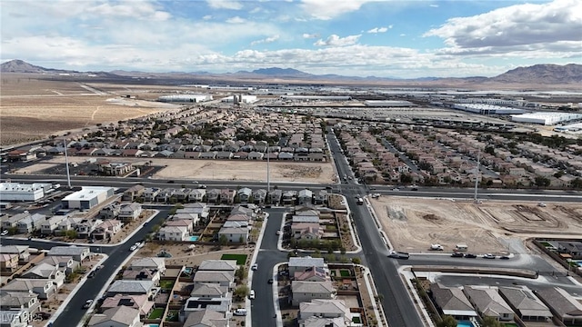 bird's eye view with a residential view and a mountain view