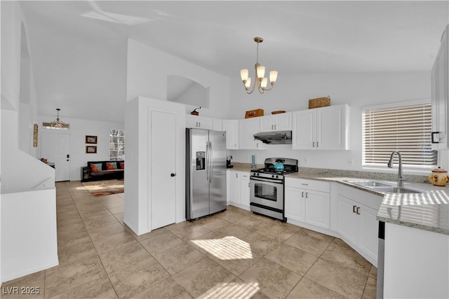 kitchen featuring an inviting chandelier, stainless steel appliances, under cabinet range hood, white cabinetry, and a sink