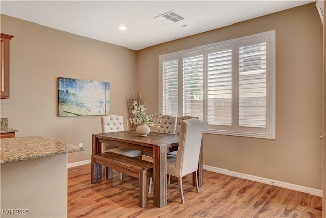 dining space with recessed lighting, visible vents, baseboards, and light wood-type flooring