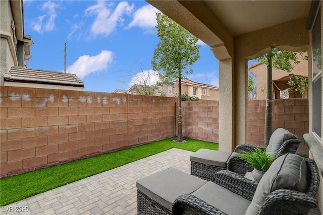 view of patio with a fenced backyard