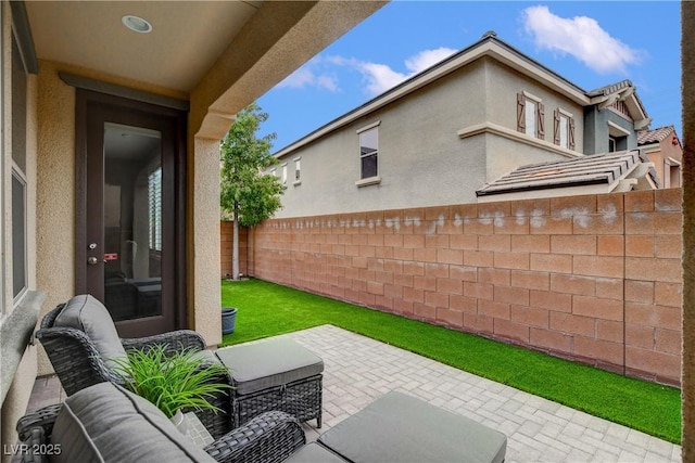 view of patio featuring a fenced backyard