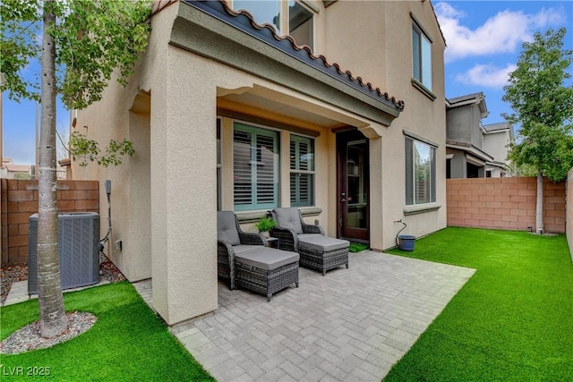 view of patio / terrace with cooling unit and fence