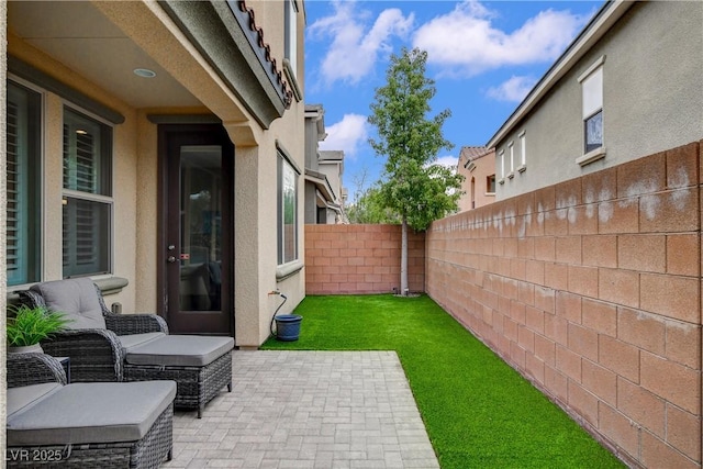 view of patio featuring a fenced backyard