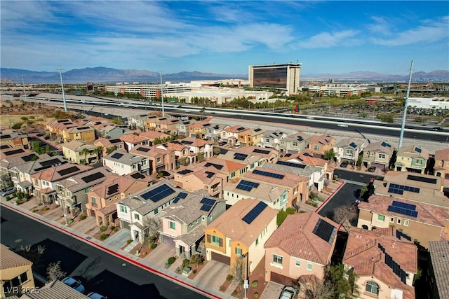 drone / aerial view with a mountain view and a residential view