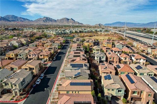 aerial view featuring a mountain view and a residential view