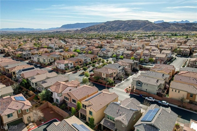 bird's eye view featuring a mountain view and a residential view