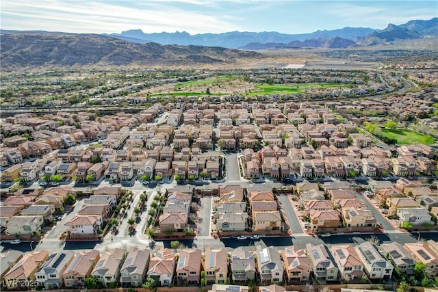 drone / aerial view with a mountain view and a residential view