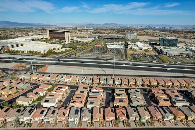 aerial view with a mountain view and a residential view