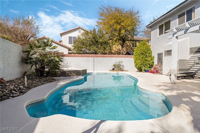 view of pool featuring a fenced in pool, a patio, a fenced backyard, and a pergola