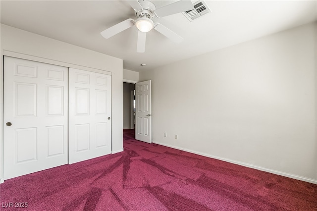 unfurnished bedroom with visible vents, baseboards, carpet floors, a closet, and a ceiling fan