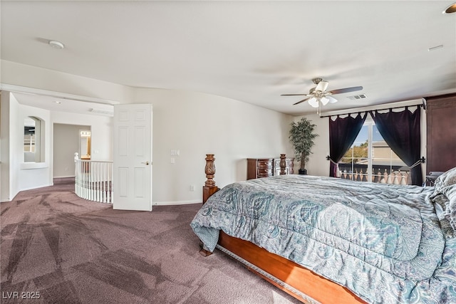 bedroom featuring visible vents, carpet flooring, baseboards, and ceiling fan