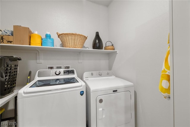 laundry room with laundry area and washing machine and dryer