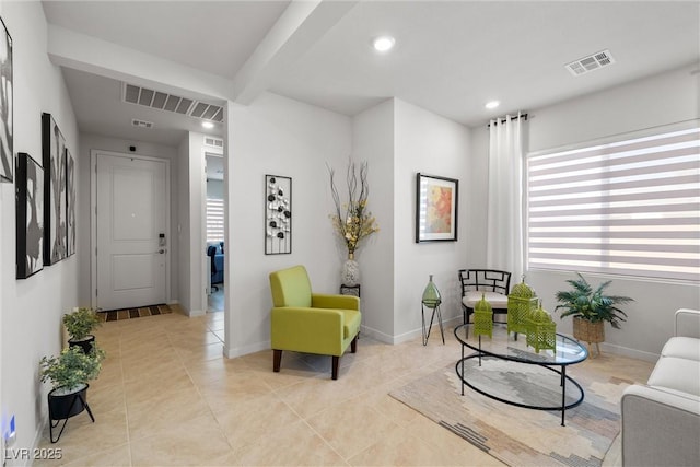 sitting room with recessed lighting, light tile patterned flooring, baseboards, and visible vents