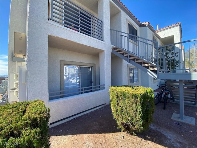 view of property with stairway