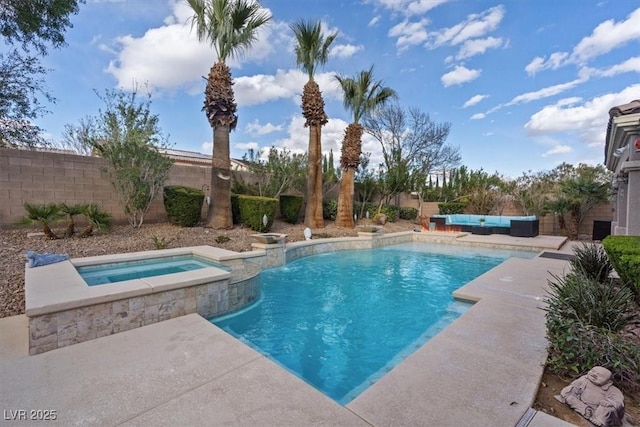 view of pool featuring a fenced backyard, an in ground hot tub, an outdoor living space, a fenced in pool, and a patio area