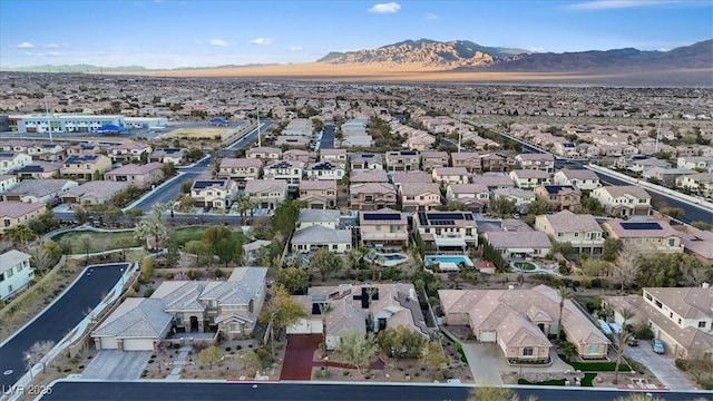 bird's eye view featuring a residential view and a mountain view