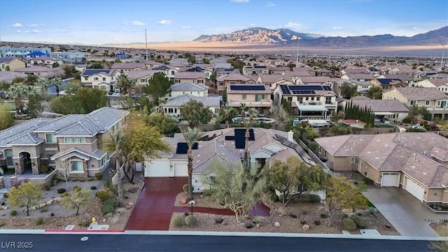 aerial view featuring a mountain view and a residential view