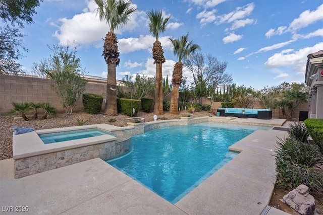 view of pool featuring a patio area, outdoor lounge area, a fenced backyard, and a pool with connected hot tub