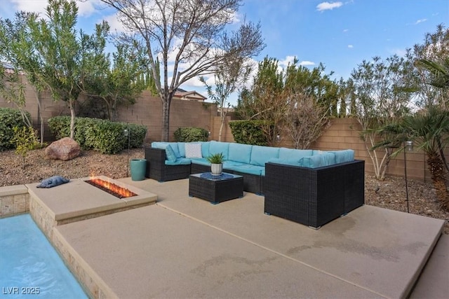 view of patio with an outdoor hangout area and a fenced backyard