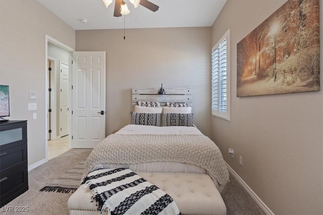 bedroom featuring ceiling fan, baseboards, and carpet flooring