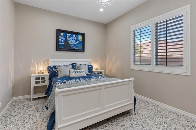 bedroom featuring baseboards