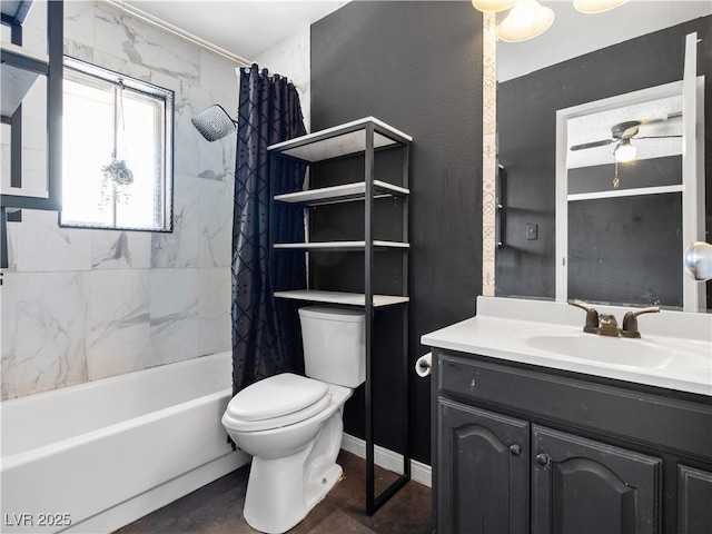 full bath featuring shower / bath combo with shower curtain, toilet, vanity, and ceiling fan