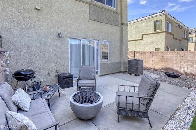 view of patio / terrace featuring fence, an outdoor hangout area, cooling unit, and area for grilling