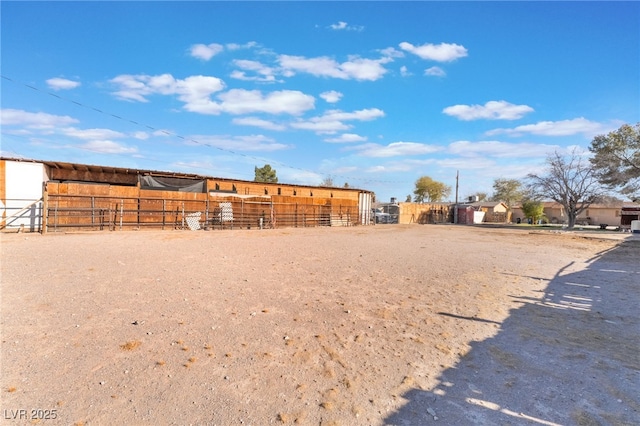 view of yard with an exterior structure and an outbuilding