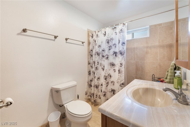 bathroom with toilet, curtained shower, and vanity