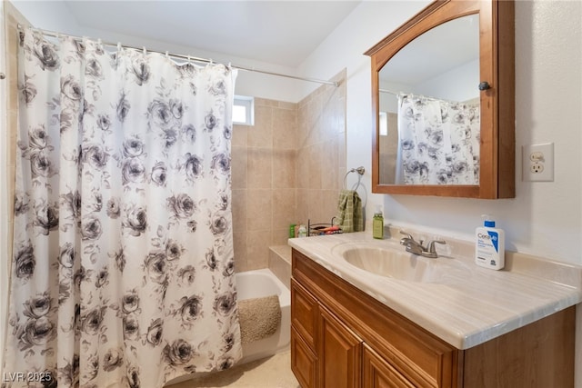 full bathroom with shower / bath combo with shower curtain and vanity