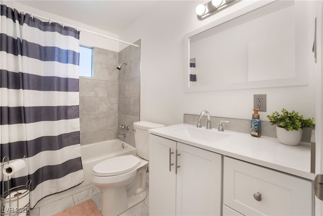 bathroom featuring toilet, shower / tub combo, and vanity