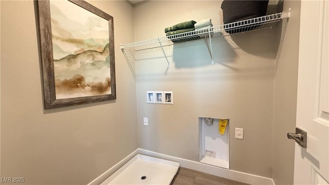 4181 Nopal Serrano Ave, Las Vegas, NV 89141 - laundry room with electric dryer hookup, hookup for a washing machine, and wood finished floors