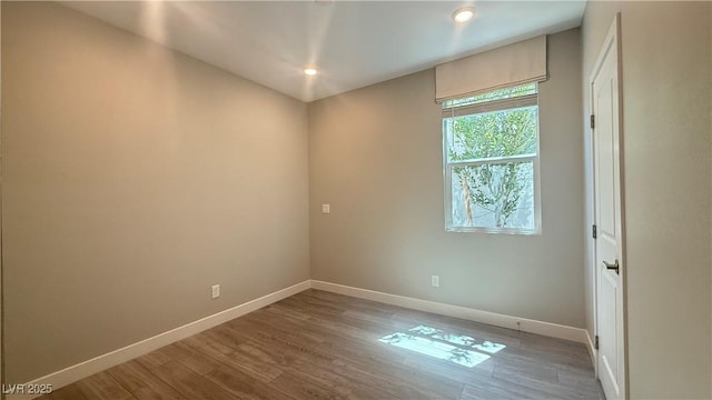 4181 Nopal Serrano Ave, Las Vegas, NV 89141 - unfurnished room featuring wood finished floors and recessed lighting