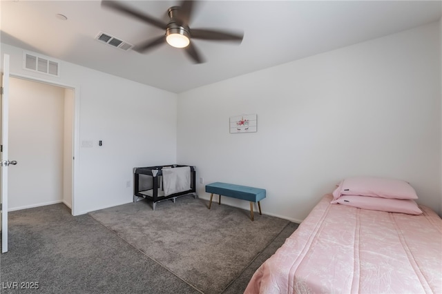 bedroom with ceiling fan, visible vents, and carpet flooring